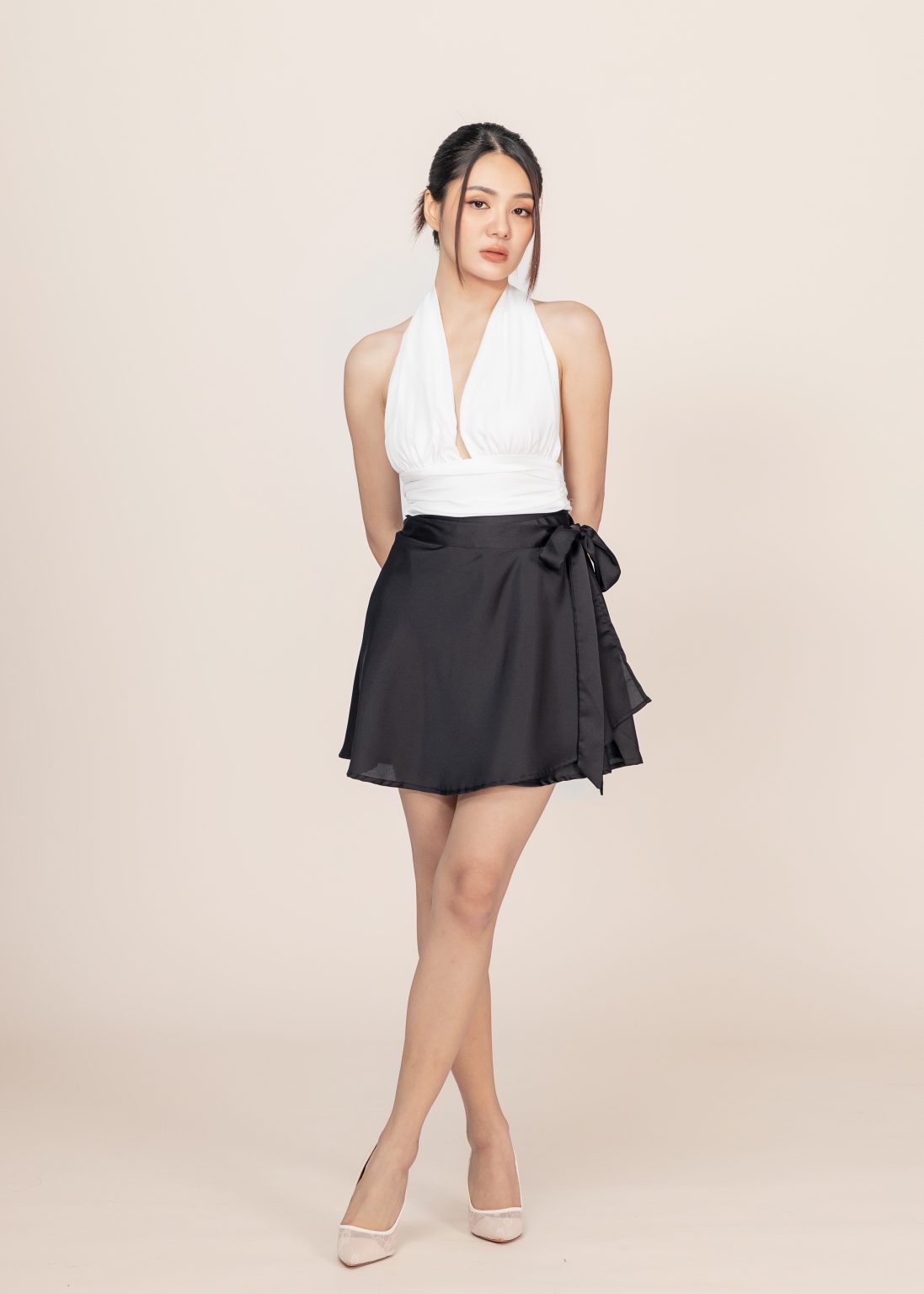 Seraphic Serenade Satin Wrap Mini Skirt In Black